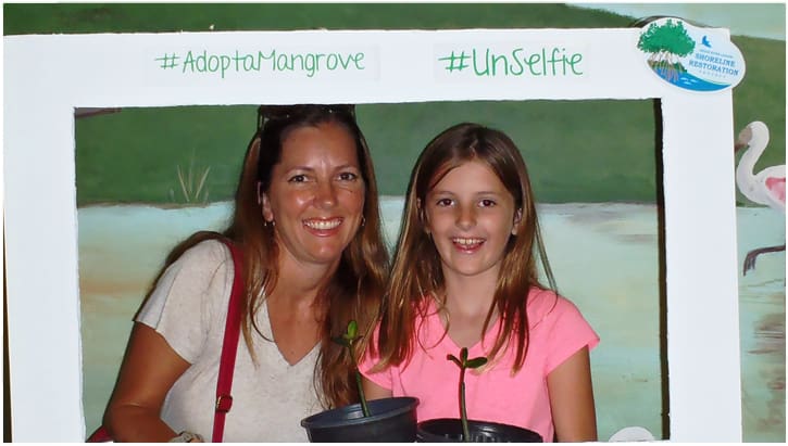 adopt a mangrove unselfie of woman and her daughter